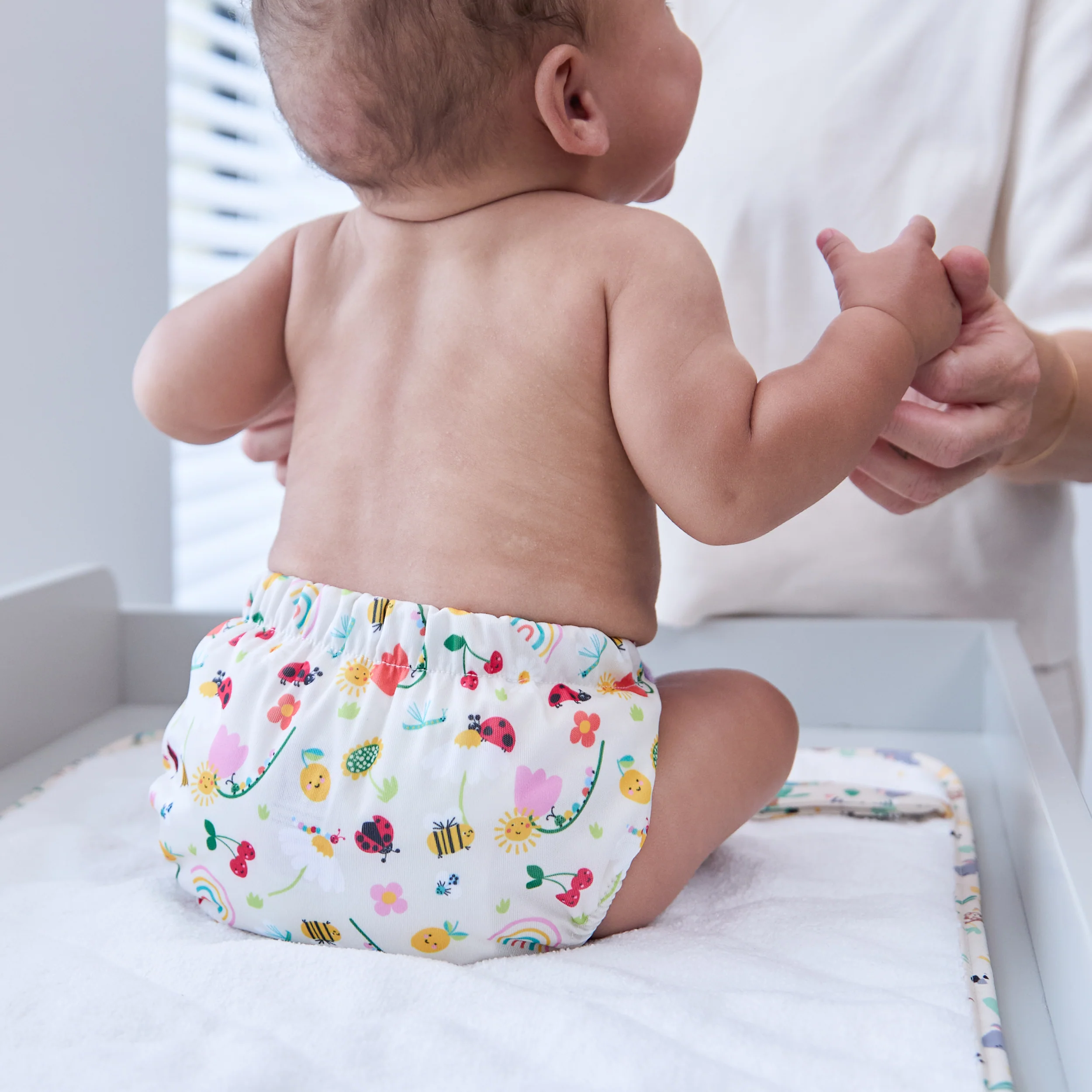 On-The-Move Baby Changing Mat in Sunshine Friends - Image 6